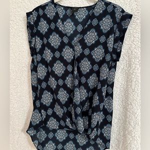 Ann Taylor hi-low, false wrap, gathered front bottom.